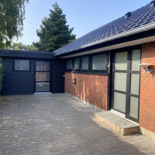 tagrenovering af rødt hus