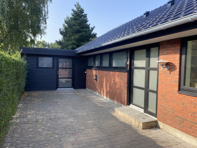 tagrenovering af rødt hus